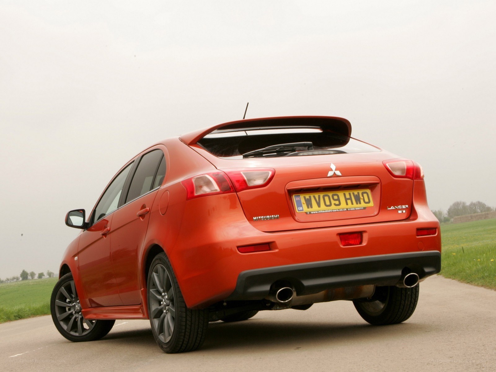 red mitsubishi lancer