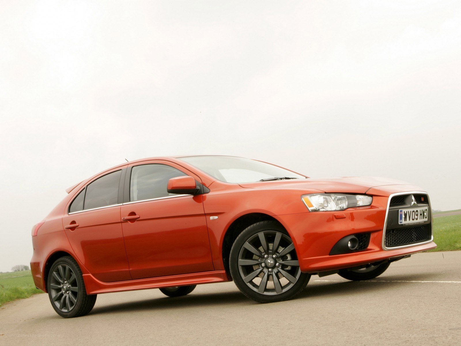 red mitsubishi lancer