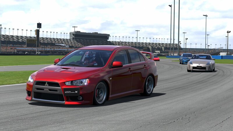 Red Mitsubishi Lancer — Competitive, Afternoon
