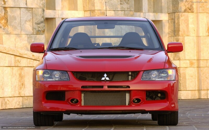 Red Mitsubishi Lancer — Dramatic, Afternoon, Photograph, Car, Stone Wall
