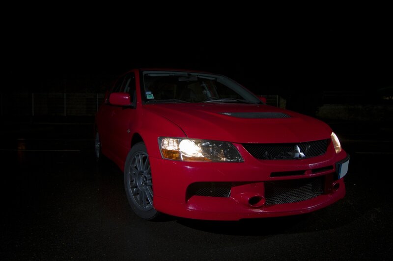 Red Mitsubishi Lancer — Dramatic, Night, Photograph, Car