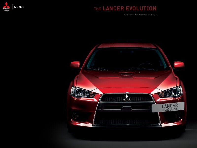 Red Mitsubishi Lancer — Dramatic, Photograph, Car, Logo
