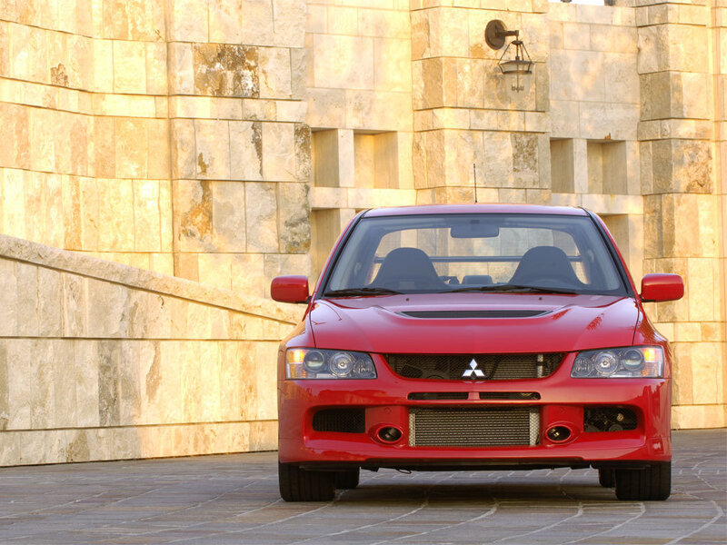 Red Mitsubishi Lancer — Dramatic, Sunset, Photograph, Car, Stone Wall