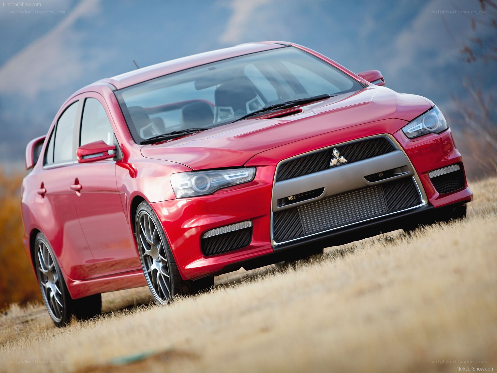 red mitsubishi lancer evolution