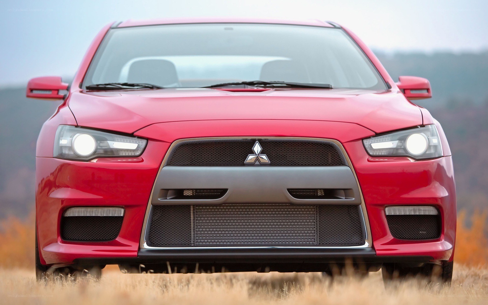 red mitsubishi lancer evolution