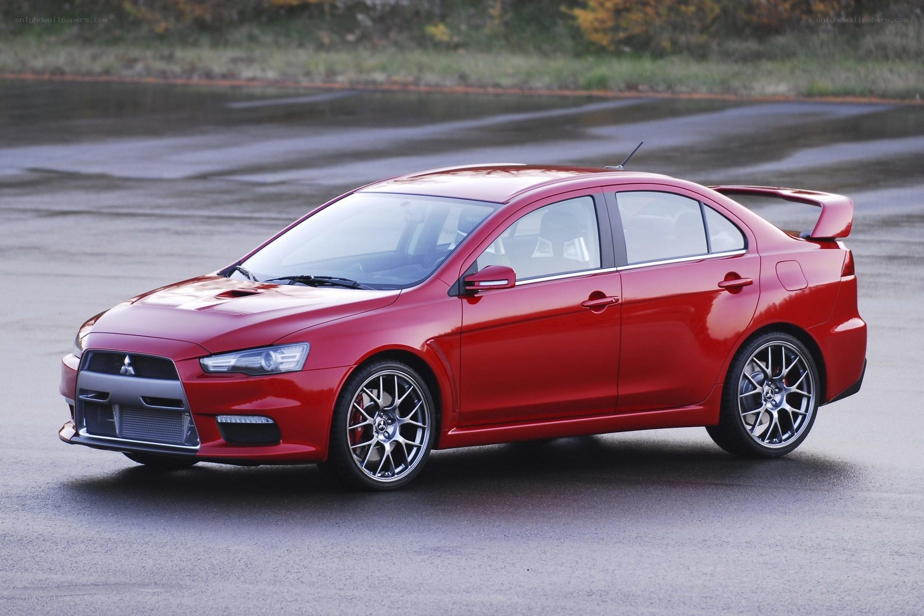 red mitsubishi lancer evolution