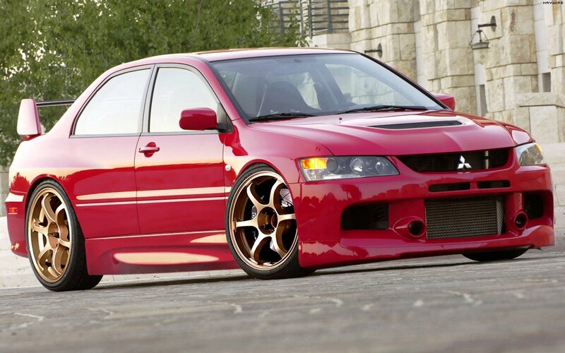 red mitsubishi lancer evolution
