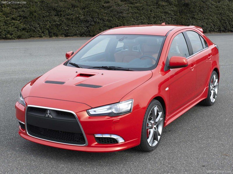 red mitsubishi lancer evolution