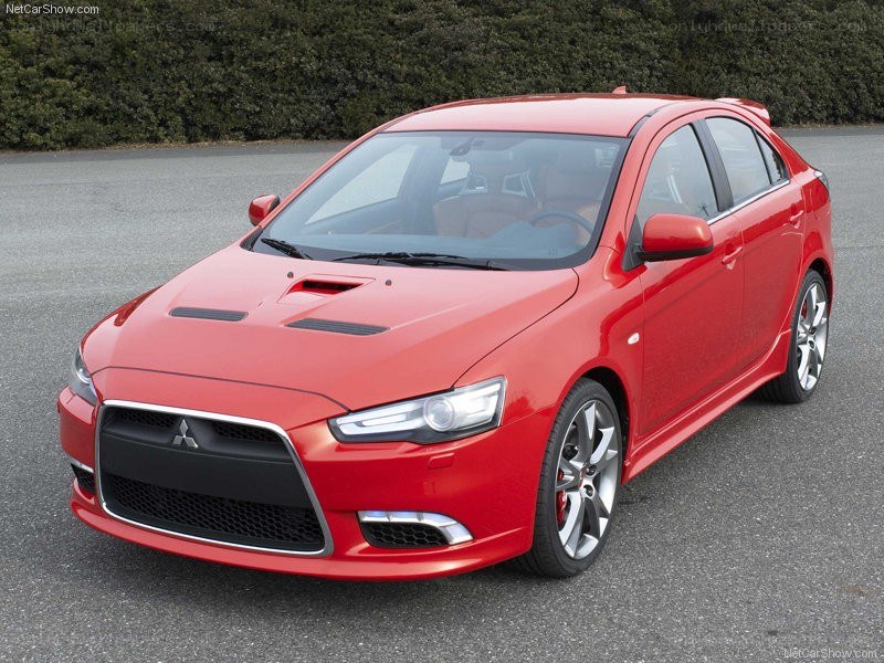 red mitsubishi lancer evolution