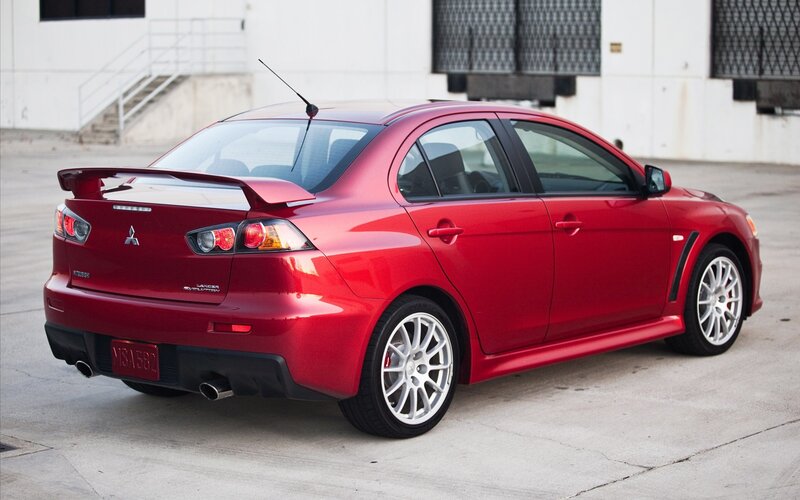 red mitsubishi lancer evolution