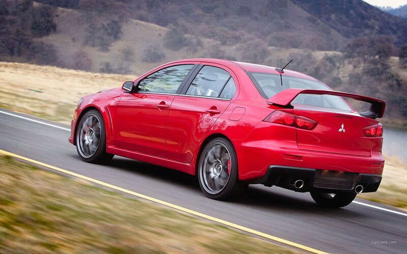 red mitsubishi lancer evolution