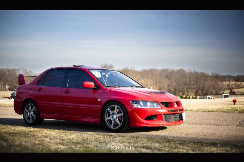 red mitsubishi lancer evolution