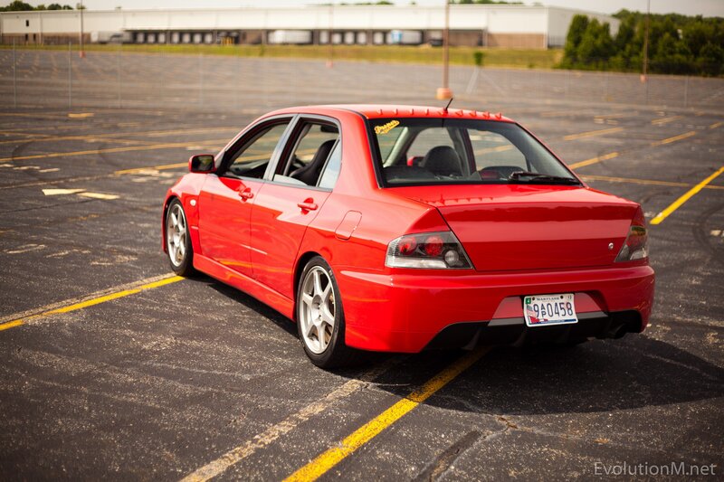 red mitsubishi lancer evolution