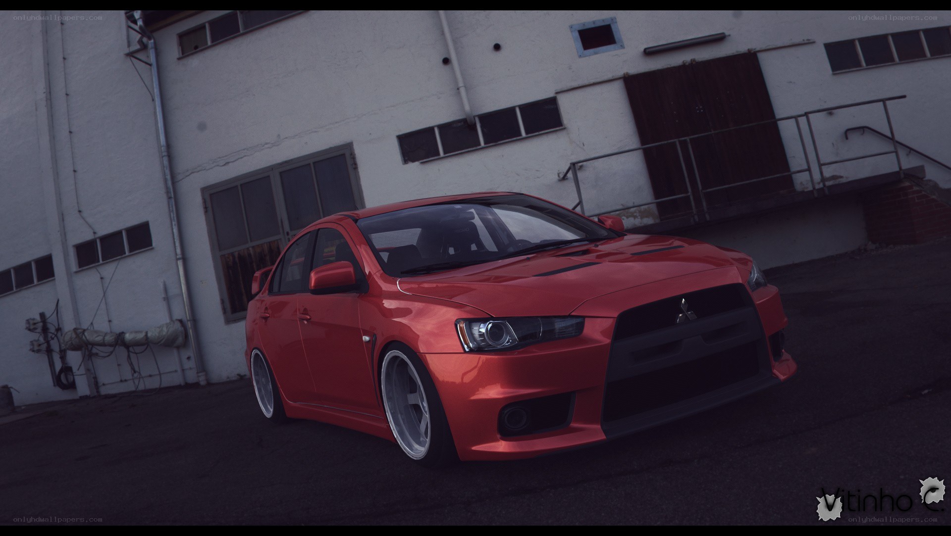 red mitsubishi lancer evolution
