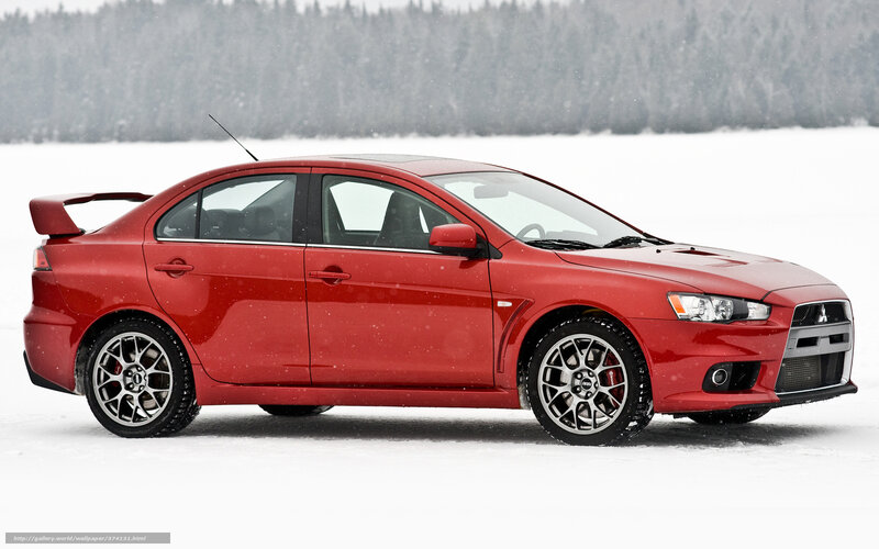 Red Mitsubishi Lancer in snow