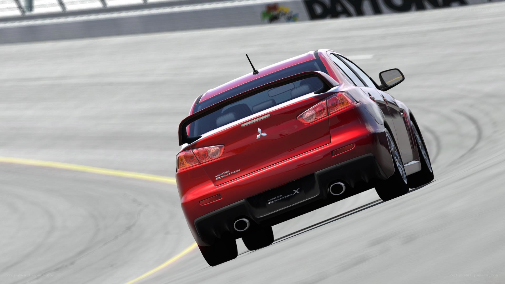 red mitsubishi lancer on racetrack