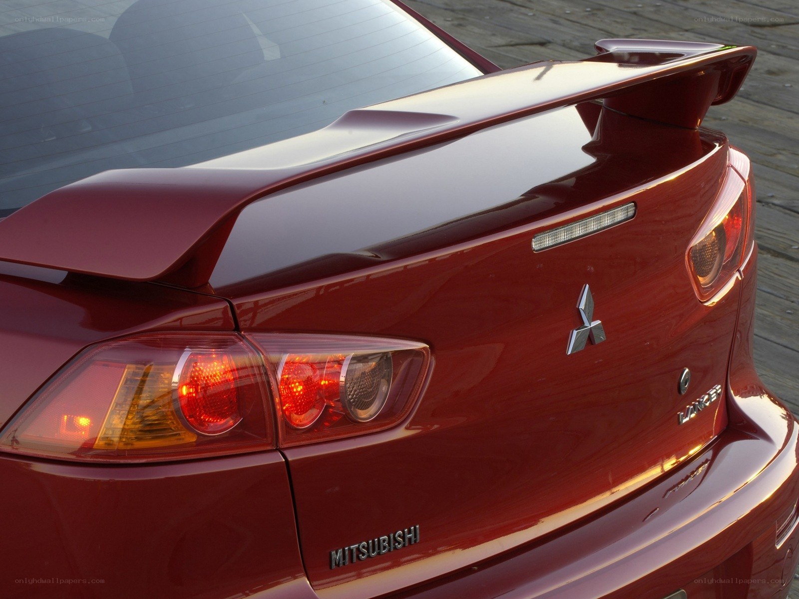 red mitsubishi lancer rear view
