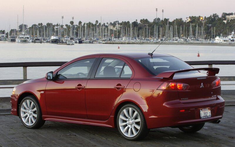 Red Mitsubishi Lancer — Serene, Sunset, Photograph, Car