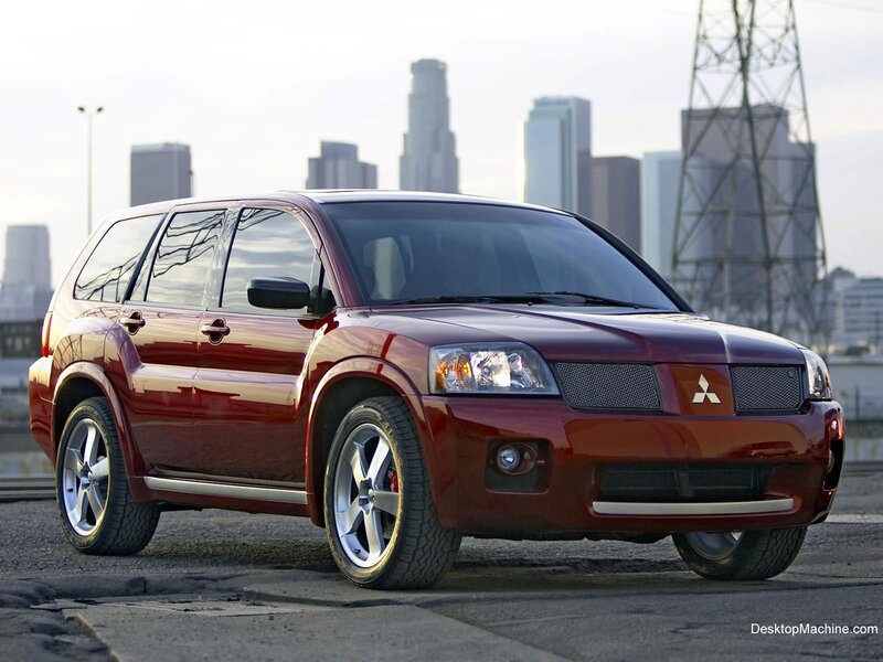 Red Mitsubishi SUV in city