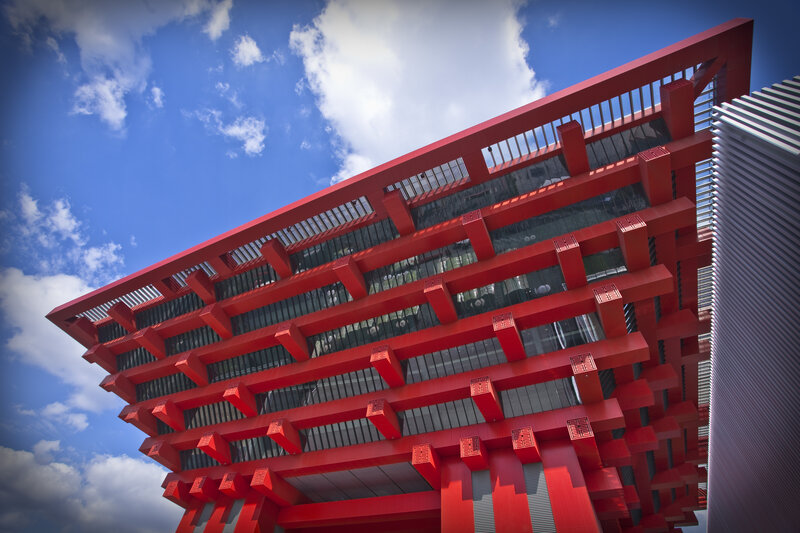 Red modern building against blue sky