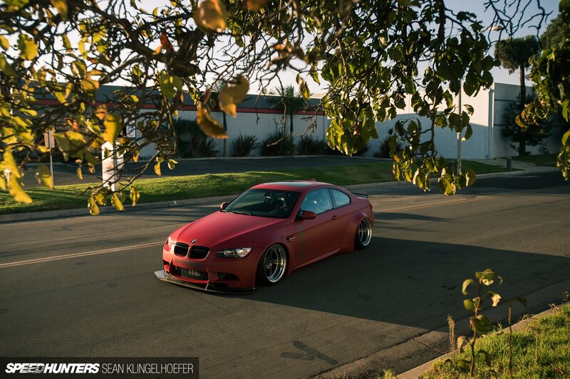 Red Modified BMW Car — Dramatic, Sunset, Photograph