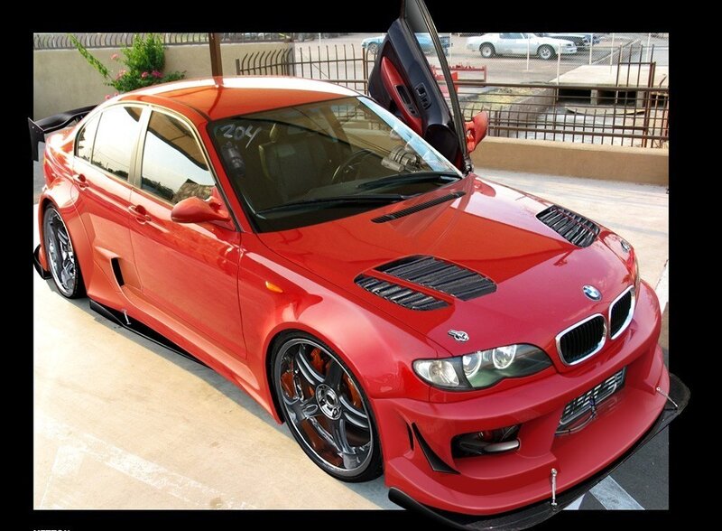 red modified bmw sedan