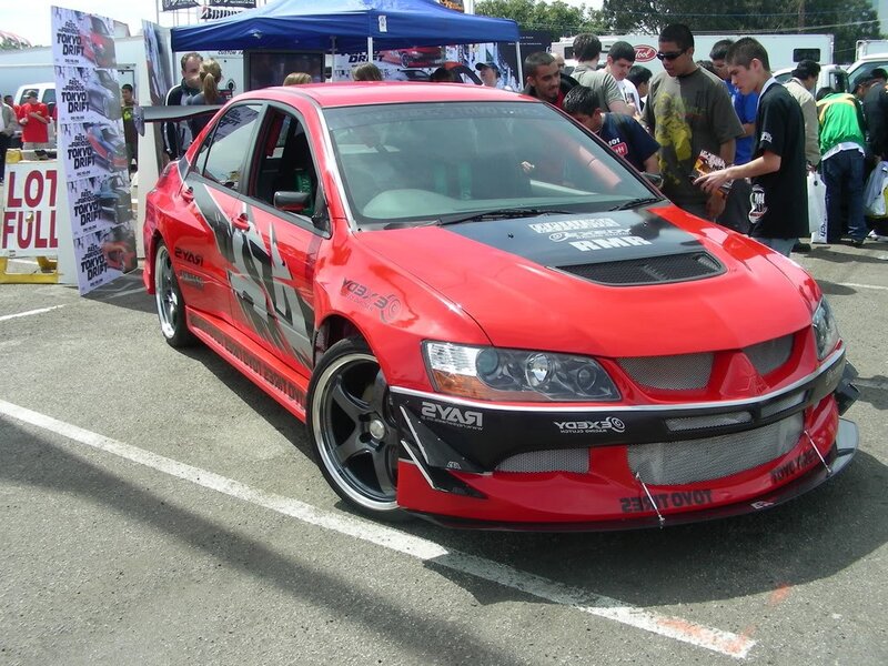 Red modified car at a show