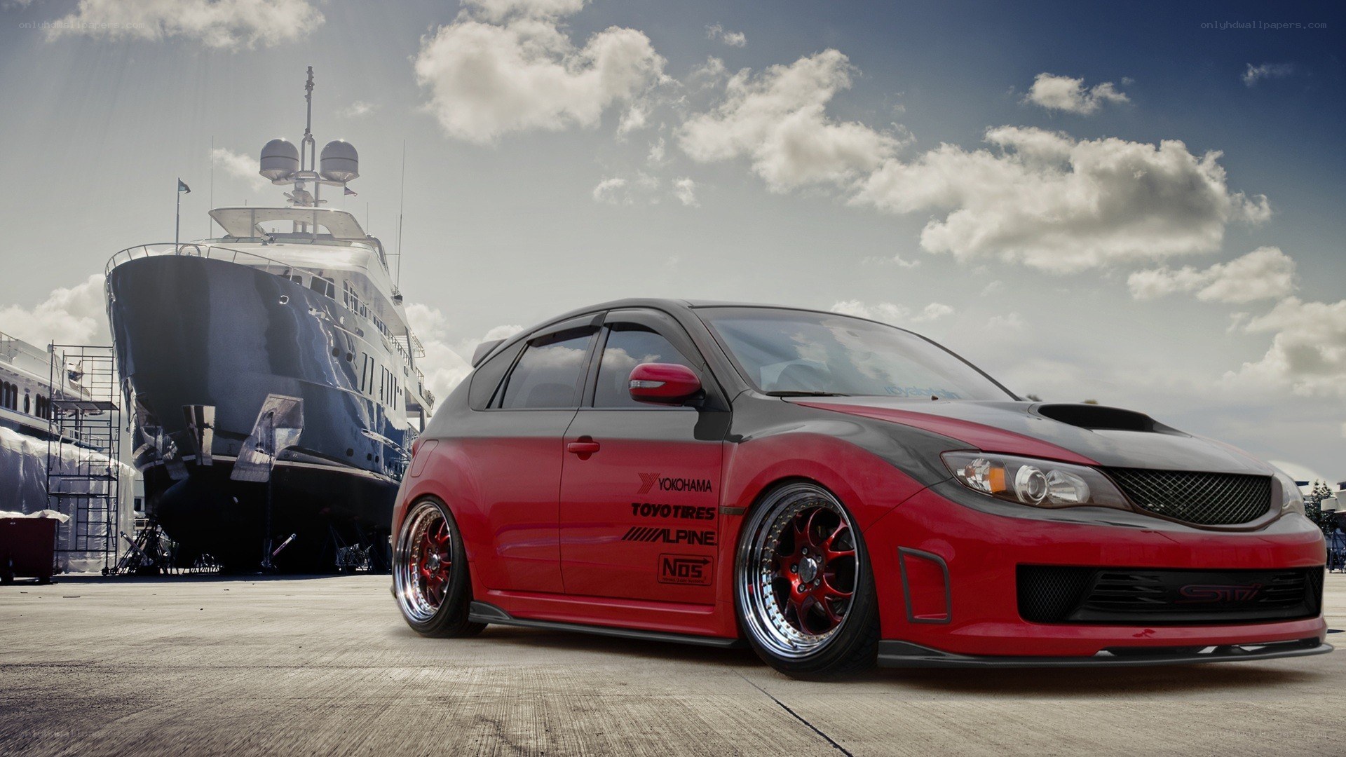 Red modified car at marina