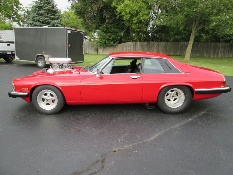Red Modified Car — Calm, Afternoon