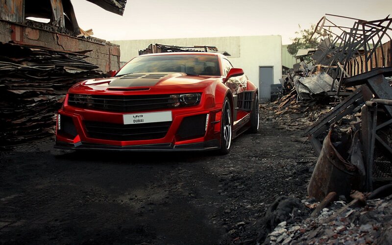 Red Modified Car — Dramatic, Afternoon, Photograph, Debris