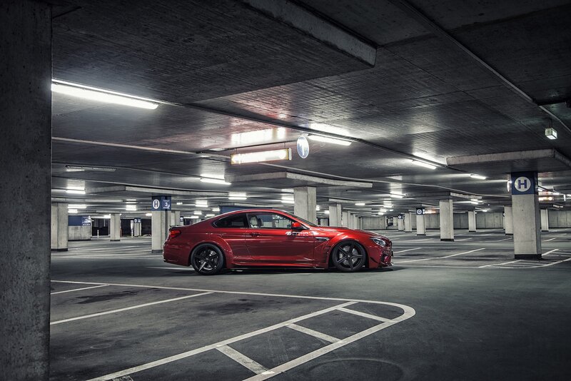 Red Modified Car — Dramatic, Photograph, Parking Garage