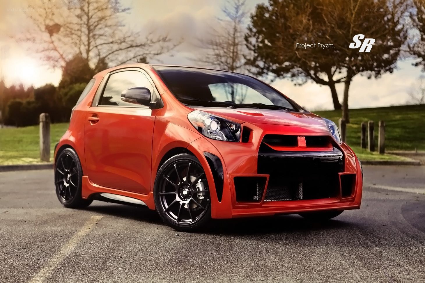Red modified compact car