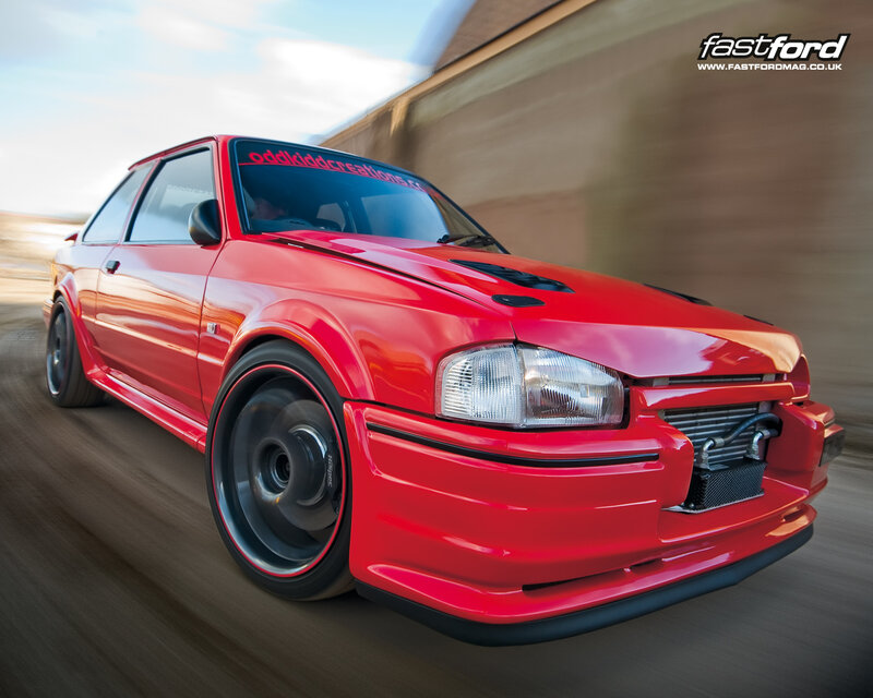 red modified ford on track