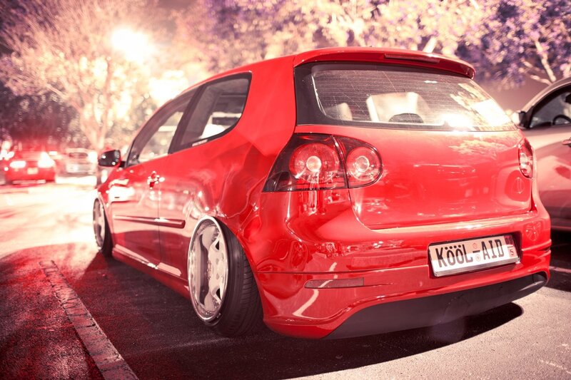 Red Modified Hatchback — Dramatic, Night