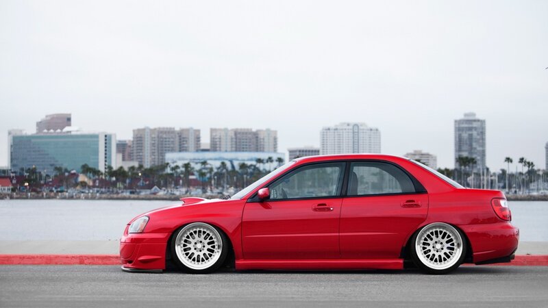 Red Modified Sedan — Calm, Photograph
