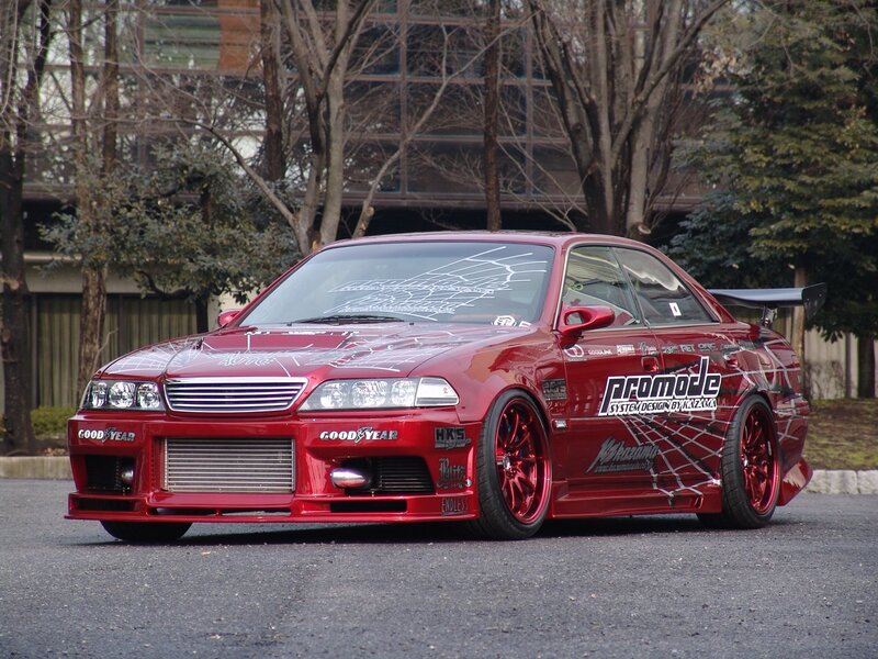 red modified sedan car