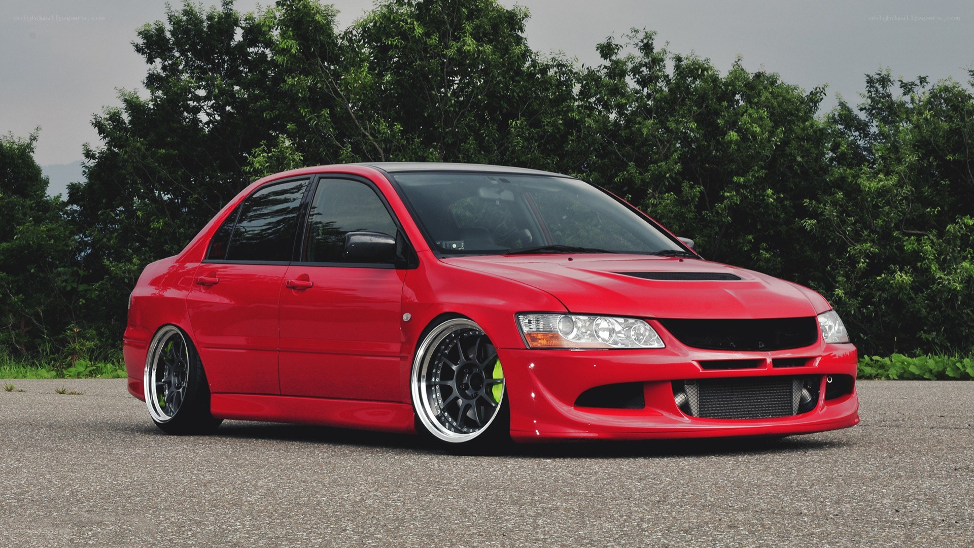 red modified sedan car