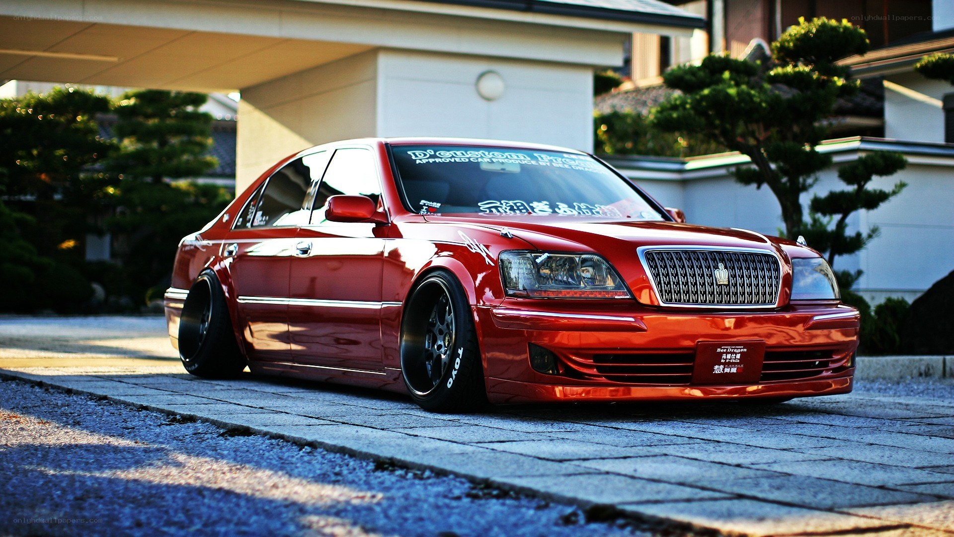red modified sedan car