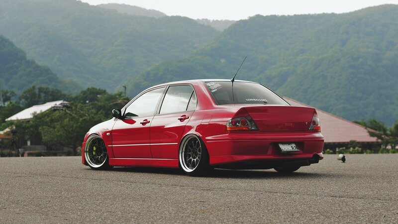Red Modified Sedan — Serene, Afternoon