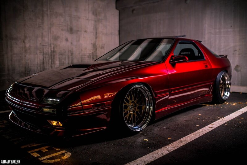 Red Modified Sports Car — Dramatic, Night, Photograph, Concrete Wall