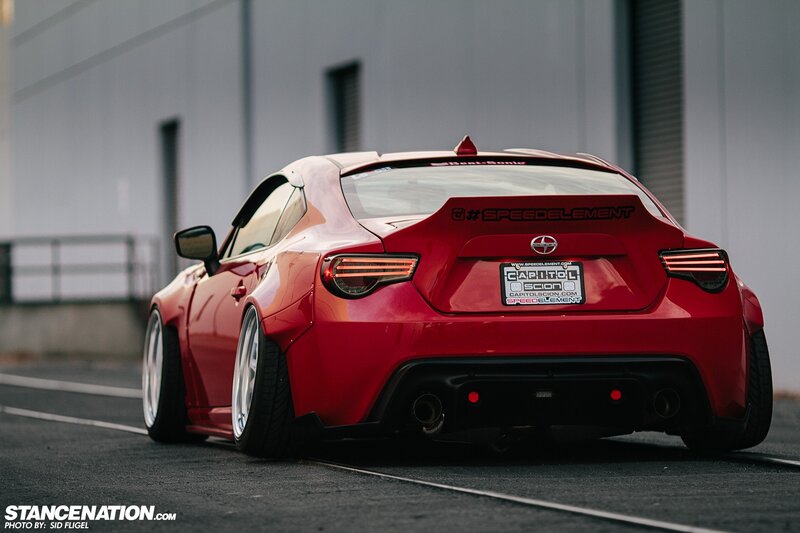 Red Modified Sports Car — Dramatic, Photograph, License Plate