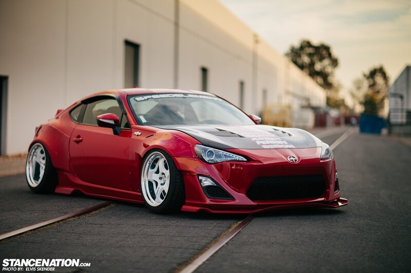 Red Modified Sports Car — Dramatic, Sunset, Photograph, Building