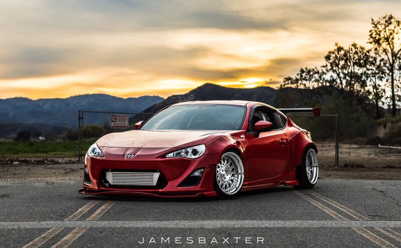 Red Modified Sports Car — Dramatic, Sunset, Photograph, Mountains