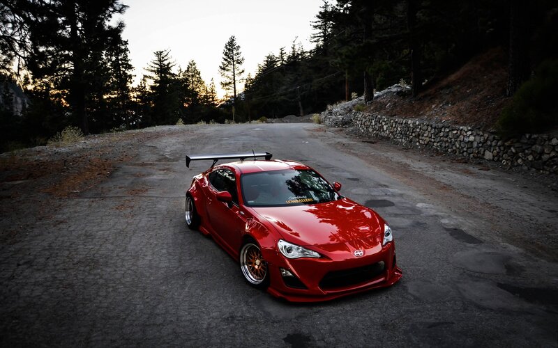 Red Modified Sports Car — Dramatic, Sunset, Photograph
