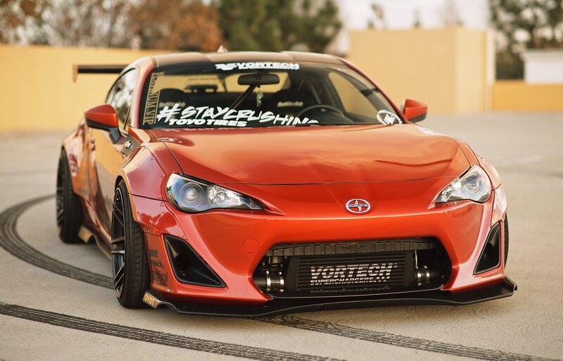 Red Modified Sports Car — Dynamic, Afternoon
