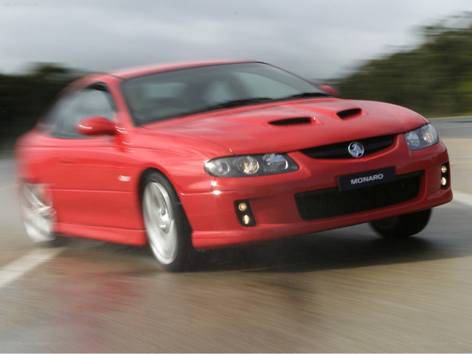 red monaro in motion