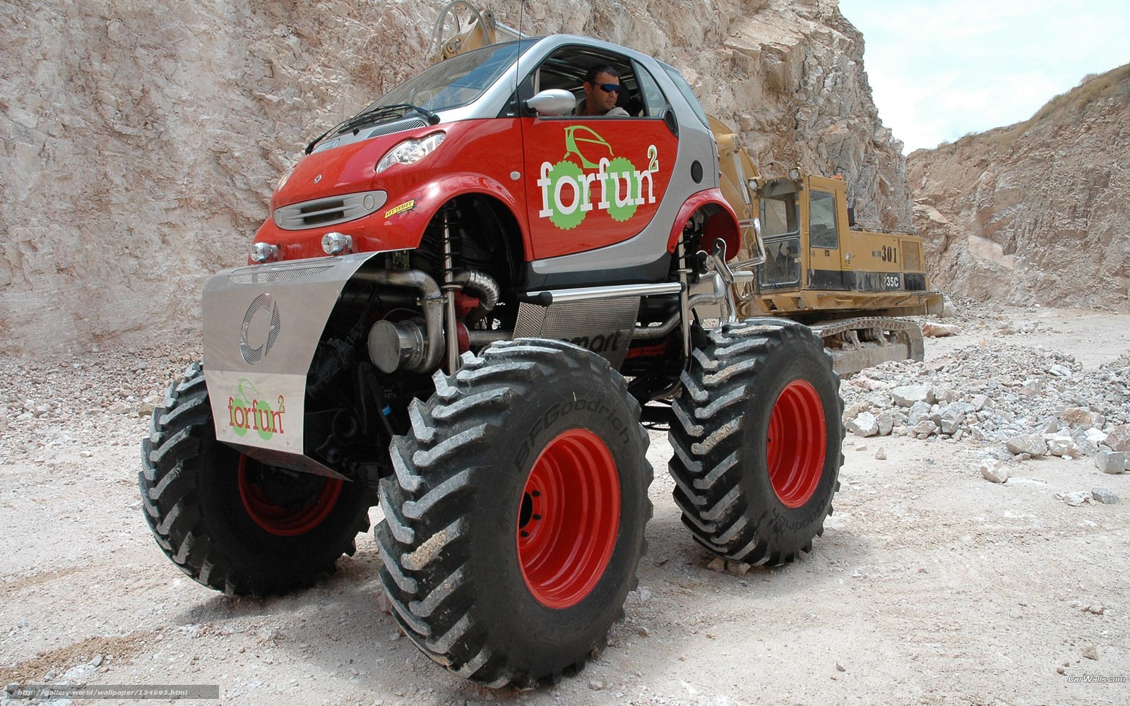 red monster truck in quarry