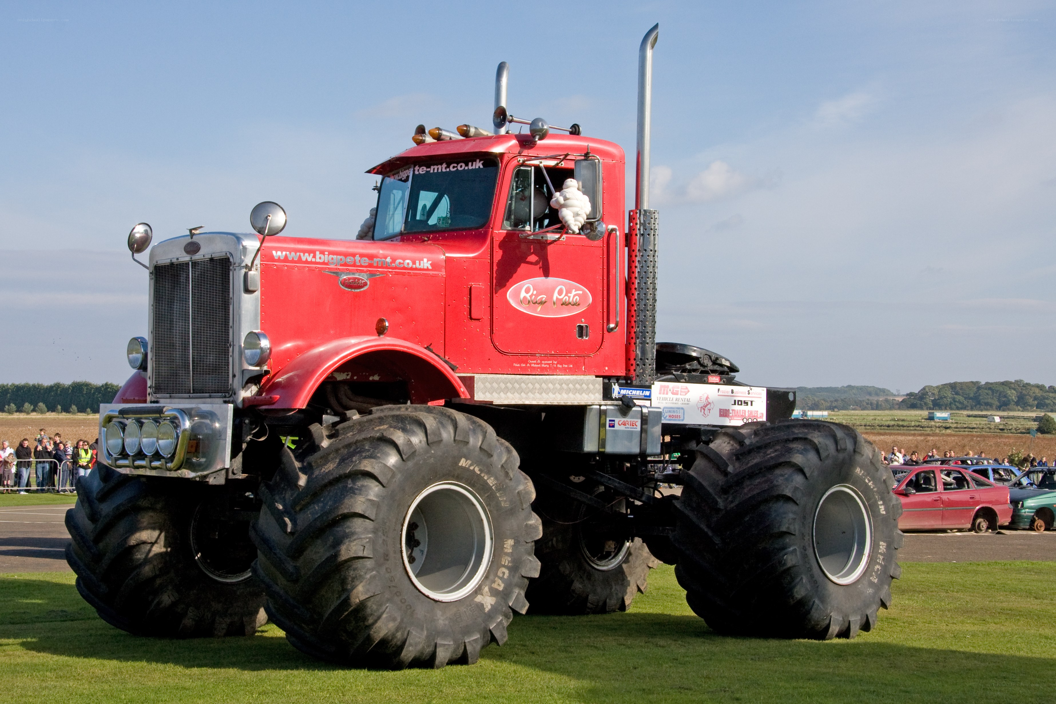 Red monster truck on grass