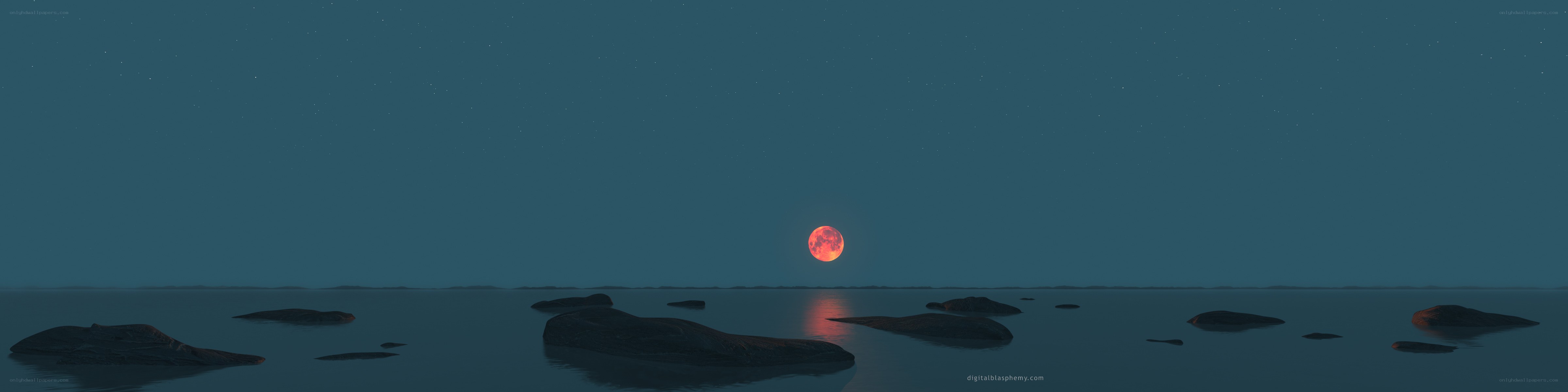 Red moon over calm sea
