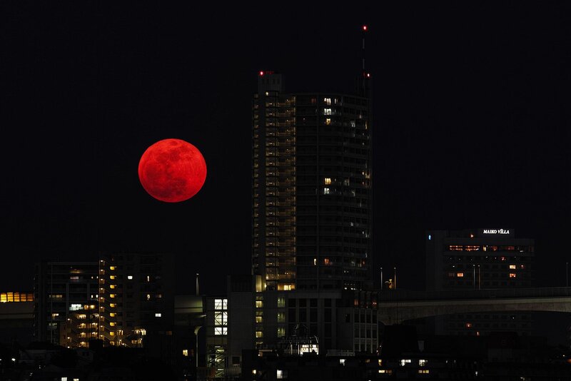 Red Moon over City — Dramatic